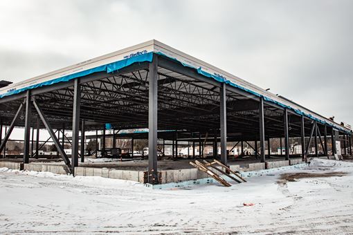 Partially constructed building with steel beams